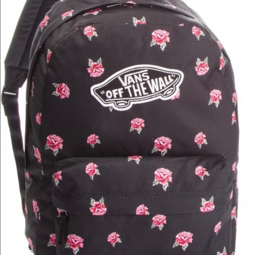 Vans backpack in black with roses. In very good condition.